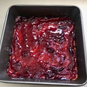 jam spread over pastry base