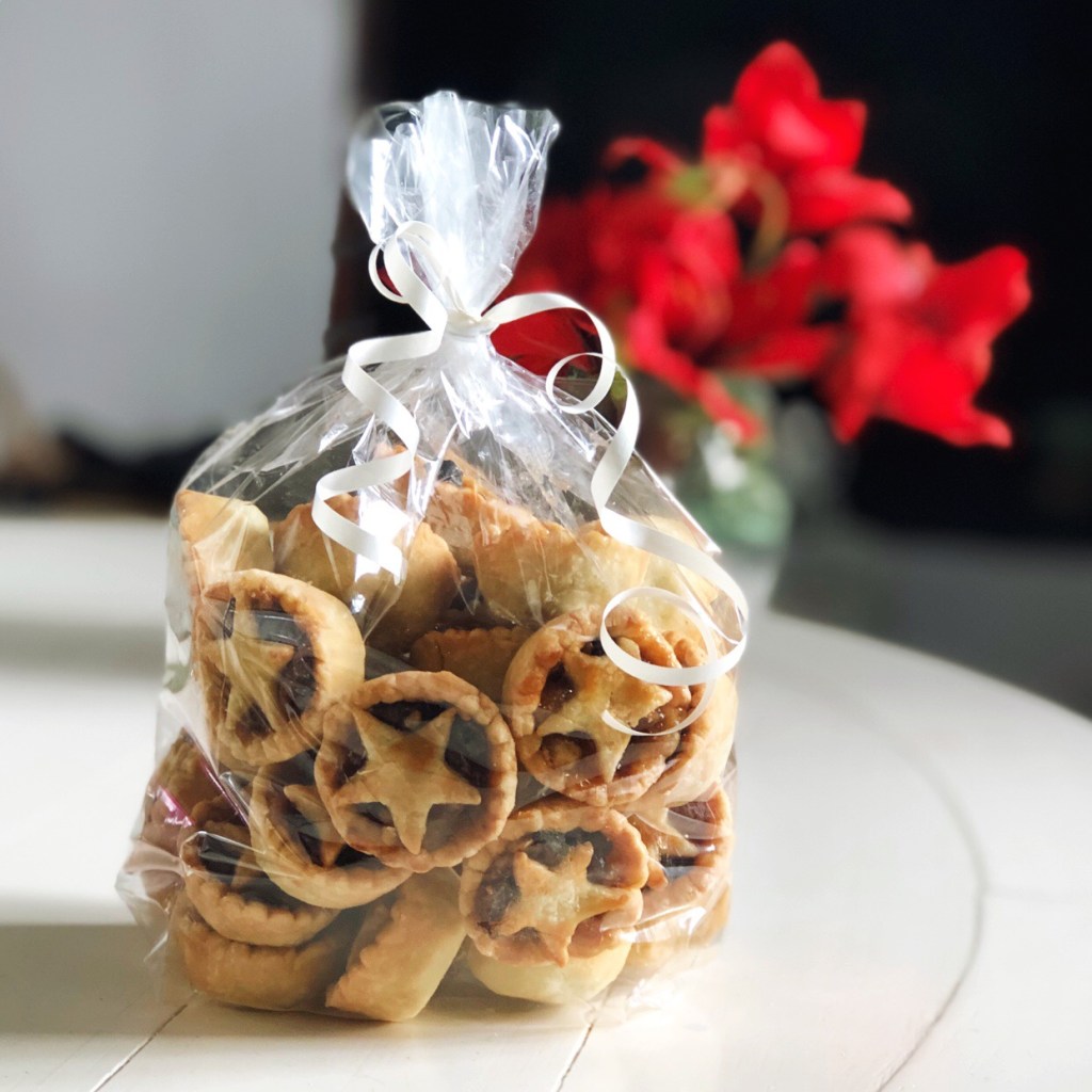 homemade mini mince pies in a transparent gift bag